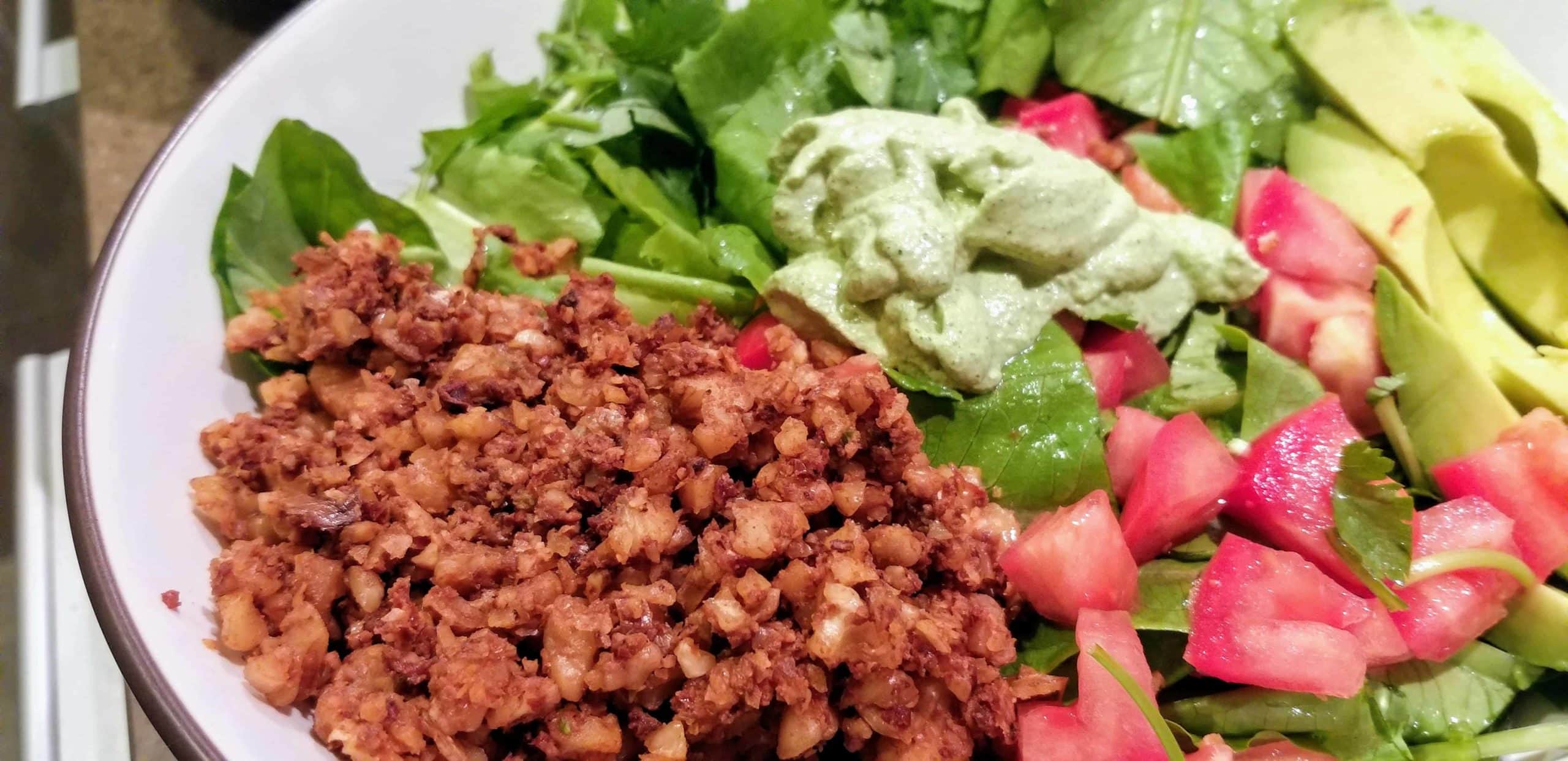 Cancer-fighting low-carb, raw vegan taco salad with walnut meat and cashew crema