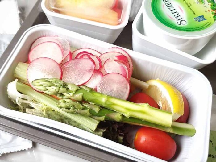 Ordering the raw vegan option on a flight can help you keep your diet while traveling